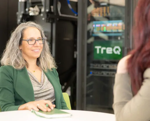 Team members in discussion at TreQ
